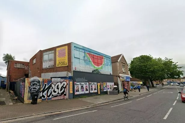 A building and shop front on Gloucester Road in Bishopston that has been empty and boarded up for nearly 20 years - pictured here in 2025