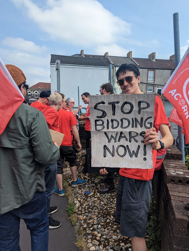 Members of the tenants union ACORN lobby outside offices of CJ Hole lettings agencies across Bristol