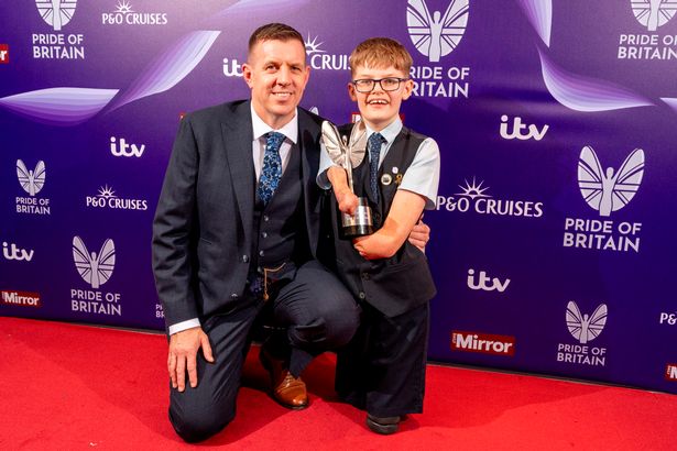 Child of Courage winner Luke Mortimer (with his dad Adam) is presented his award by Laura Kenny, Ellie Kildunne, Billy Monger and Jason Leonard
