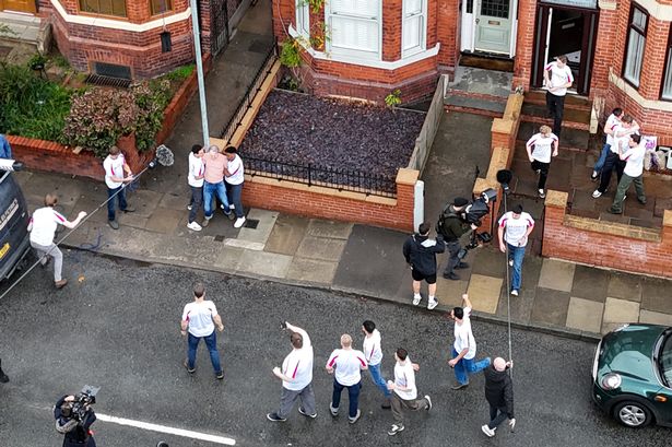 A group of extras, dressed as football fans, were filmed shouting and surrounding a top Hollywood actor in Salford this week