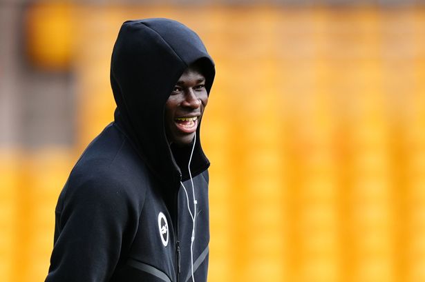 Carlos Baleba smiles