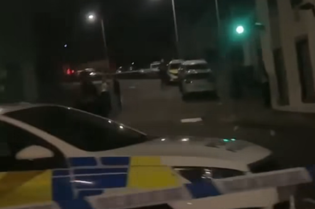 Police at the scene last night. 