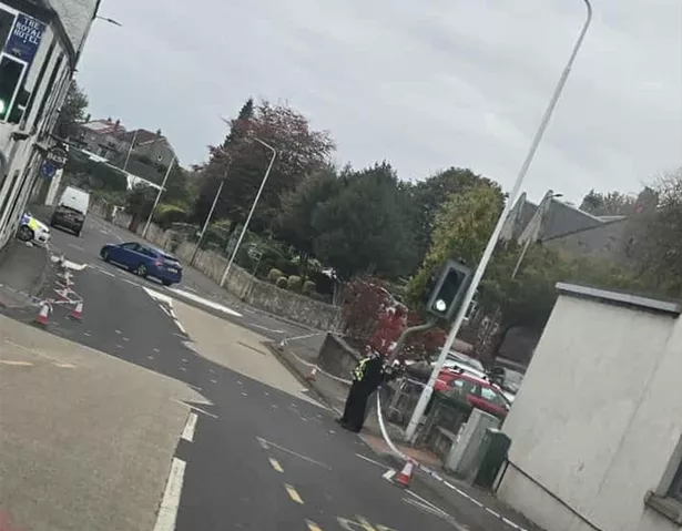 Two police officers at the scene. 