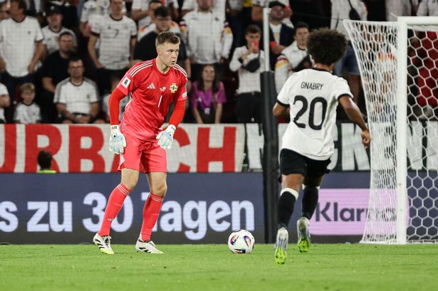 Northern Ireland's Bailey Peacock-Farrell in action against Germany