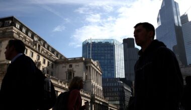 UK job postings fall, firms downbeat about outlook, surveys show