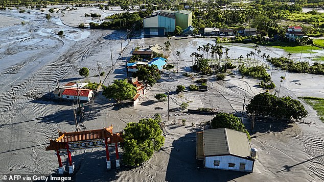 An aerial image shows part of Guangfu township flooded after a barrier lake burst in Hualien on September 25, 2025
