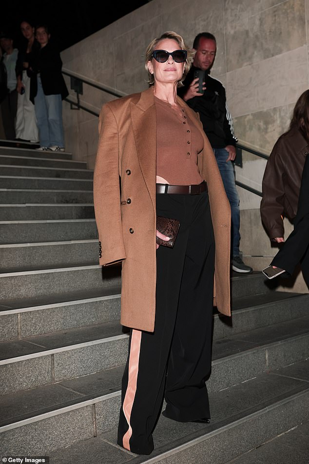 Robin's visit to the French capital comes after she revealed her parenting regrets with now ex husband Sean Penn, 65