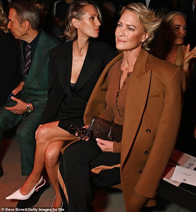 Her model daughter Dylan put on a leggy display in a stylish blazer dress which she paired with white heels