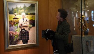 Princess Anne unveils a new portrait of King Charles III, taken by photographer Millie Pilkington, during a visit to the Scottish Parliament Building, Holyrood,  September 2025