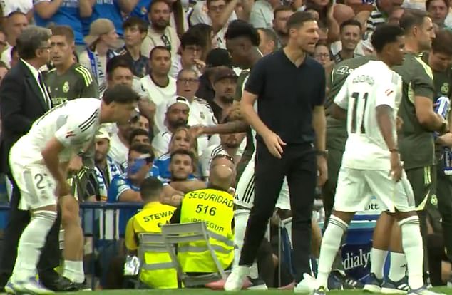 The Brazilian star was seen throwing a water bottle as he made his way to the bench