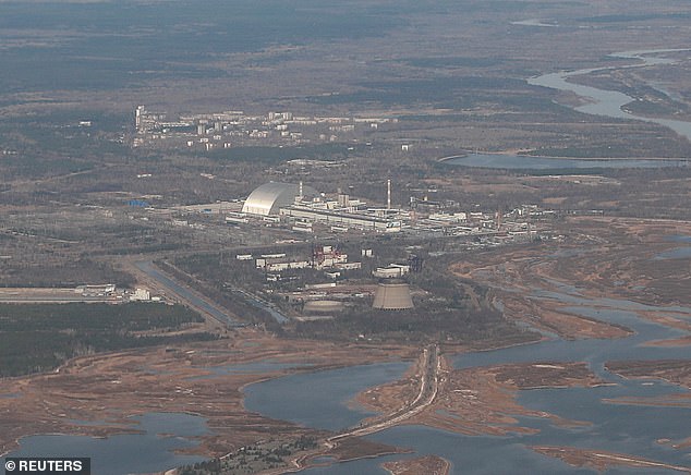Kyiv said a Russian shelling attack cut power to the defunct Chernobyl nuclear plant. File photo: An aerial view from a plane shows a New Safe Confinement (NSC) structure over the old sarcophagus covering the damaged fourth reactor at the Chernobyl Nuclear Power Plant during a tour to the Chernobyl exclusion zone, Ukraine April 3, 2021