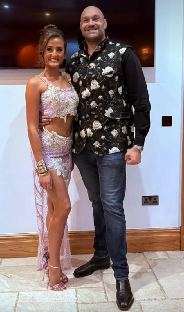 Tyson pictured with his eldest daughter Venezuela, who is engaged to her boxer boyfriend