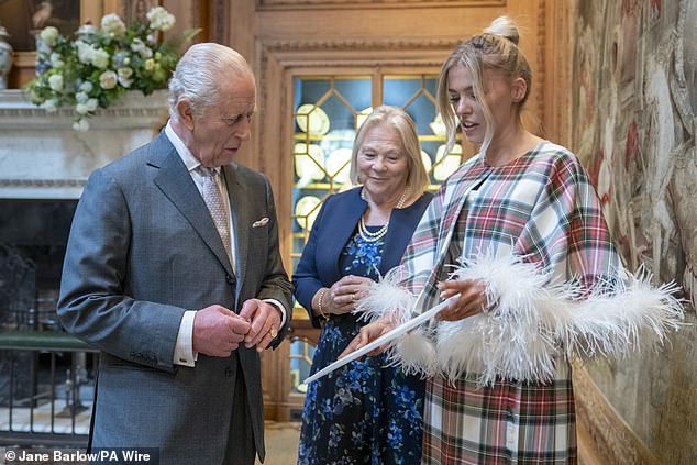 Speaking to the group at the organisation's headquarters at Dumfries House in Ayrshire, Charles, 76, marvelled at a tartan outfit sported by Siobhan Mackenzie (pictured, right) a Scottish fashion designer from the Black Isle