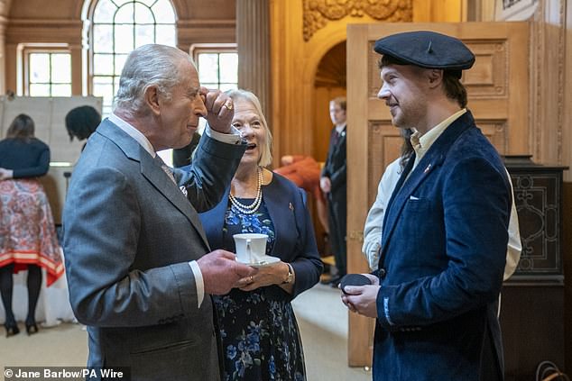 After spending more than 45 minutes with the group for what should have been a half-hour engagement, the royal then watched as they placed some of the items into the Foundation's anniversary time capsule