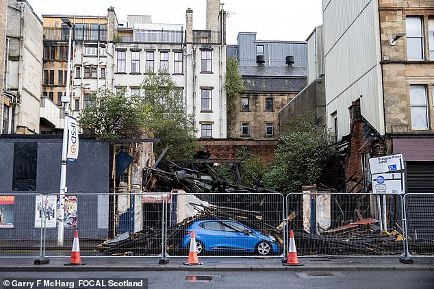 Barriers were put up around the scene of the collapsed building, which was derelict
