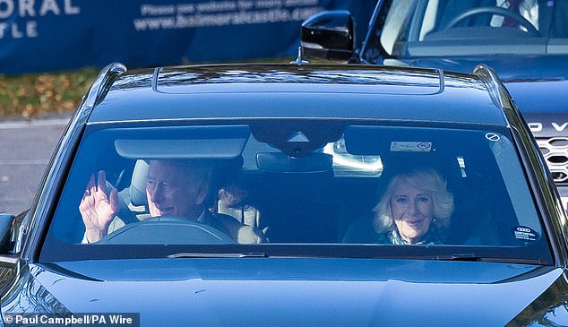 A royal wave: The King and Queen appeared in great spirits as they were spotted arriving for Sunday church service today