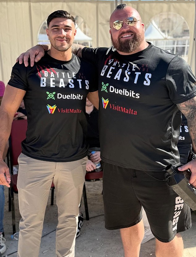 The boxer shared a snap with British strongman legend Eddie Hall out in Malta