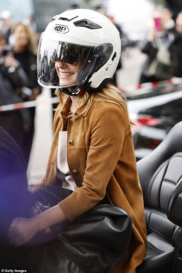 Surprisingly, the actress arrived at the Miu Miu show on the back of a motorbike