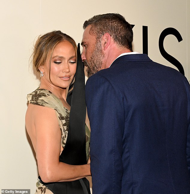 Jennifer Lopez and Ben Affleck very seen looking very cozy at the premiere of their new movie, Kiss Of The Spider Woman, in New York on Monday