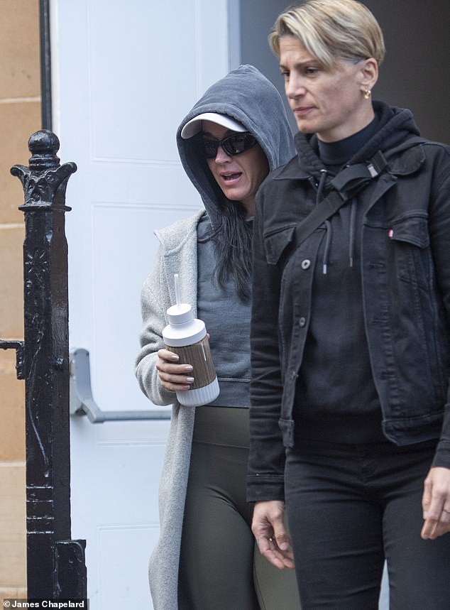 Katy was seen heading into her grey people carrier seemingly guided by a female bodyguard as she arrived in Scotland after performing in Belfast last week