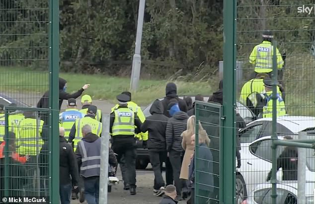 After his final game in charge of the club on Sunday, the 39-year-old had to be escorted away from The Falkirk Stadium by police