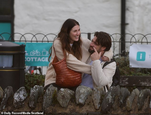 Onlookers said Martin appeared in great spirits as he and his girlfriend Lucy enjoyed a 'romantic' day out together