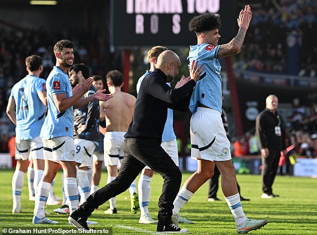 Guardiola pushes the laidback O'Reilly over to the travelling City fans to take their acclaim