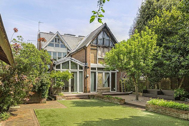 The property includes an 80ft south facing rear garden - with a self-contained garden studio, as well as a gym room and games/cinema room/bar area, according to the listing