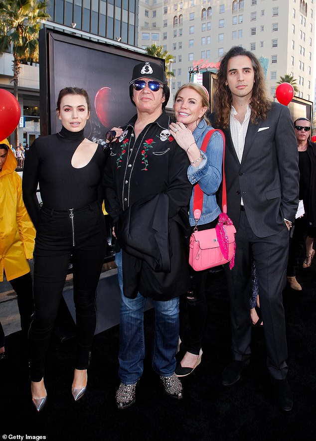 Shannon Tweed, Simmons' wife, said her husband had recently changed medications and now needs to drink more water, which he isn't particularly fond of (The couple pictured with their two children Sophie and Nick in 2017)