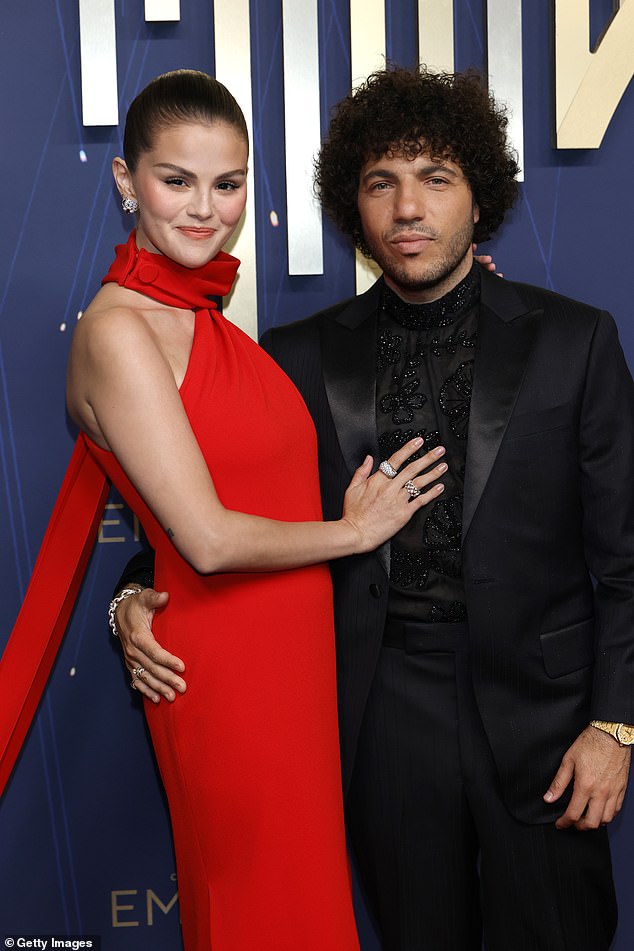 The couple revealed their romance in December 2023 after secretly dating for six months; seen in September 2025