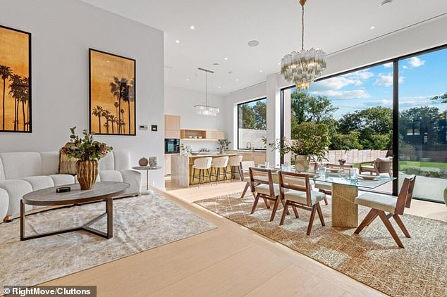 According to agents Cluttons , the 'truly remarkable home' has been 'designed from the ground up with an uncompromising commitment to quality and detail'