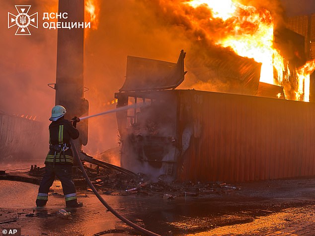 In this photo provided by the Ukrainian Emergency Service, emergency services personnel work to extinguish a fire following a Russian attack in Odesa, Ukraine this week
