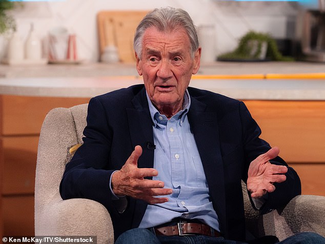 Armed soldiers stopped the crew from filming before taking Palin captive and holding him at gunpoint. Speaking at the Cheltenham Literature Festival, the Python star revealed it was the second time the 'very silly' sketch had helped him escape trouble in a totalitarian state. Pictured: Sir Michael Palin