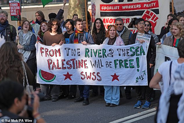 People attend a pro-Palestine protest in central London on Saturday afternoon