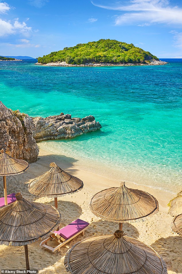 Relax on the Albanian Riviera's Ksamil Beach, with views of the Ionian Sea