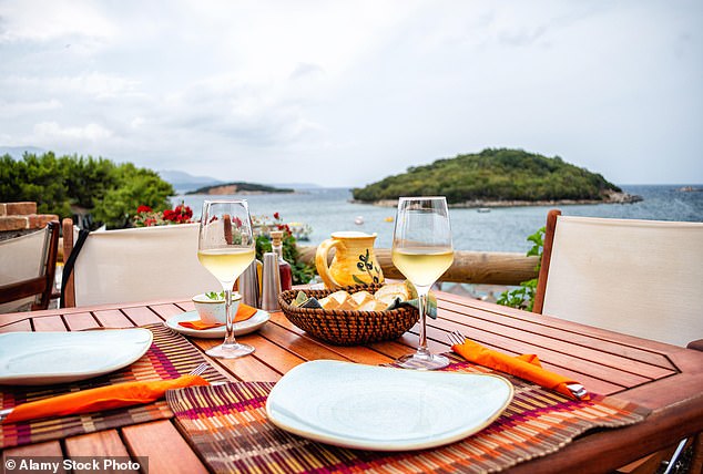 Enjoy a bite to eat overlooking the Ionian Sea when visiting the Albanian Riviera