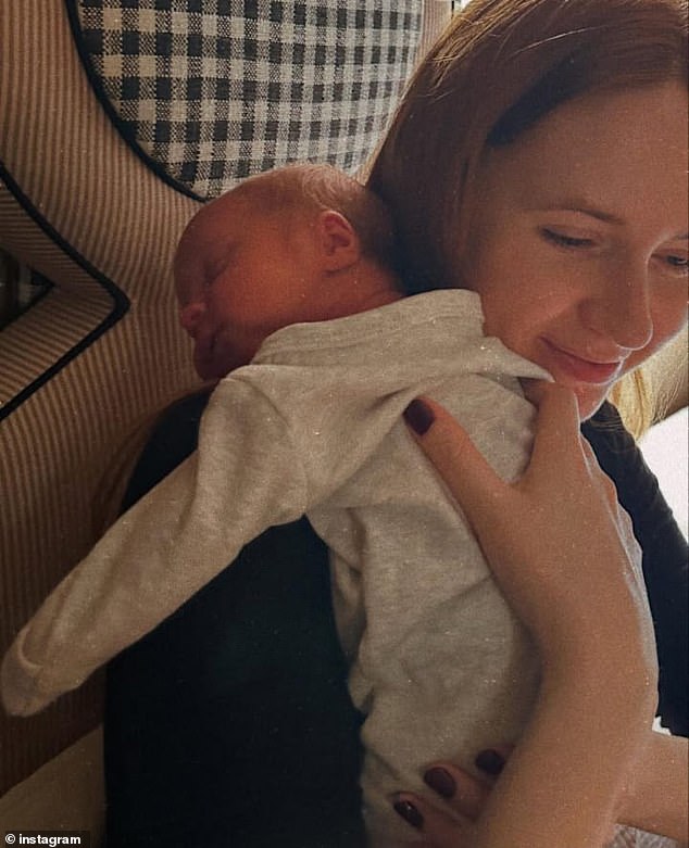 Ms Gillan cuddles her daughter Clementine