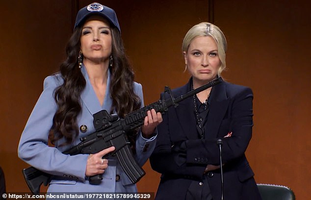 Tina Fey returned to Saturday Night Live with a biting impression of Kristi Noem, complete with her infamous 'ICE Barbie' glam and a prop firearm to match (pictured)