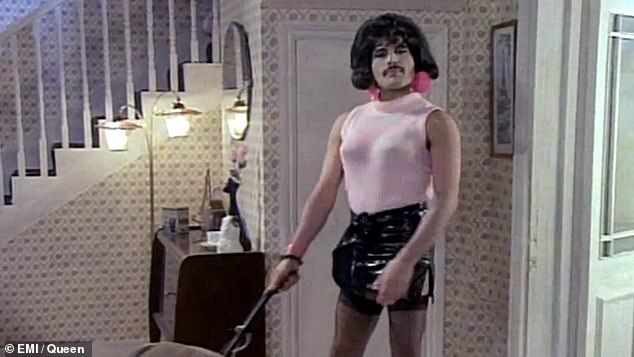 One evening featured a fancy dress party, which saw Wayne don the Queen star's iconic outfit including heels and a leather skirt from the 1984 video for I Want to Break Free (pictured)
