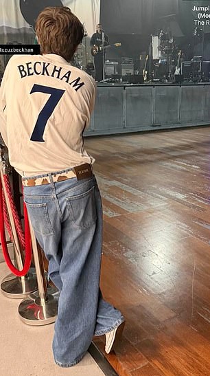 Pairing the nostalgic shirt from the noughties with some oversized jeans