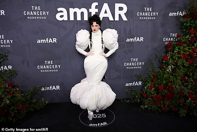 For the occasion, Julia stepped out in a white maxi dress adorned with pastel yellow flowers
