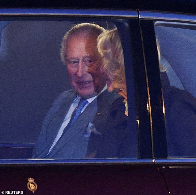 King Charles and Queen Camilla pictured inside a car as they arrive at Ciampino Airport