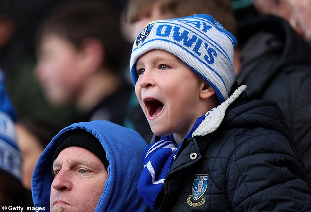 A young Wednesday supporter makes himself heard during their 2-1 loss to Oxford United on Saturday