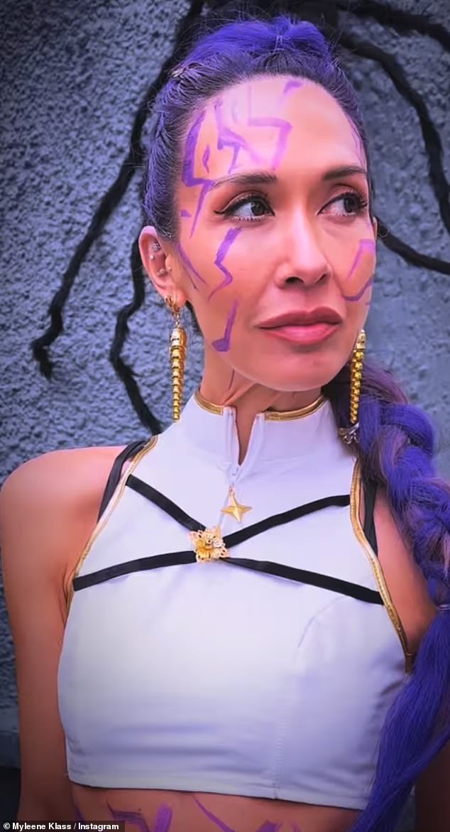 Myleene posed up a storm as she looked ready to take on her enemies in a look emulating the performer Ruby from the megahit Netflix film