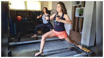 Sara Ali Khan exemplifies fitness commitment, earning accolades from her Pilates mentor, Namrata Purohit. Facing the challenges of PCOS-related weight fluctuations, she remains unwavering, always striving for excellence in her routines. Her structured lifestyle encompasses mindful eating habits, allowing her to swiftly recover from indulgences while staying consistent with her workouts—no matter where her travels take her. Sara Ali Khan's trainer Namrata Purohit reveals her unmatched dedication to fitness
