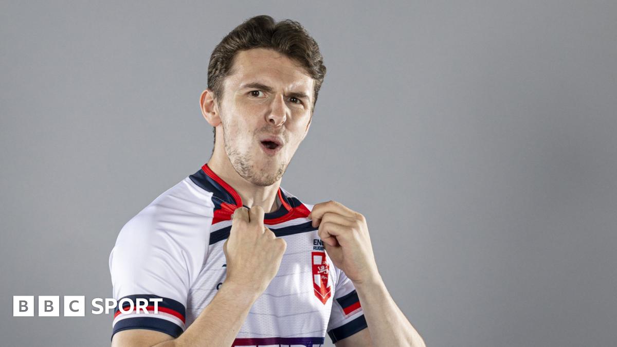 Rob Hawkins looks at the camera and celebrates