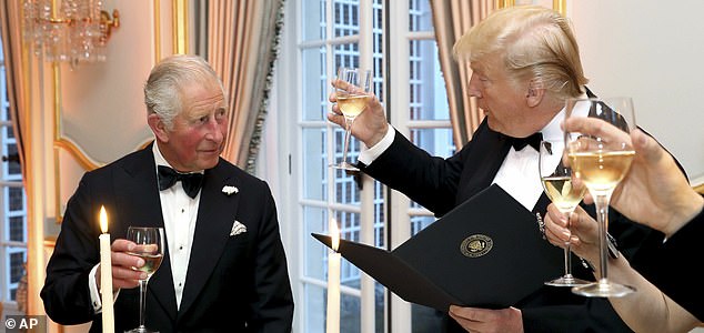 FILE - U.S. President Donald Trump and Britain's Prince Charles toast, during the Return Dinner in Winfield House, the residence of the Ambassador of the United States of America to the UK, in Regent's Park, part of the president's state visit to the UK, in London, Tuesday, June 4, 2019. (Chris Jackson/Pool Photo via AP, File)
