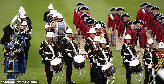 The Band of His Majesty's Royal Marines Portsmouth perform during a Beating Retreat military ceremony at Windsor Castle, Berkshire, on day one of the US President Donald Trump's second state visit to the UK. Picture date: Wednesday September 17, 2025. PA Photo. Photo credit should read: Jordan Pettitt/PA Wire