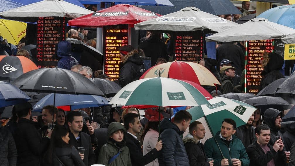 Umbrellas up: that's the trend as the wet spring continues to haunt racing
