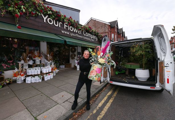 Claire Smithwick, owner of Your Flower Company, loading her van on St John's Rd in Waterloo